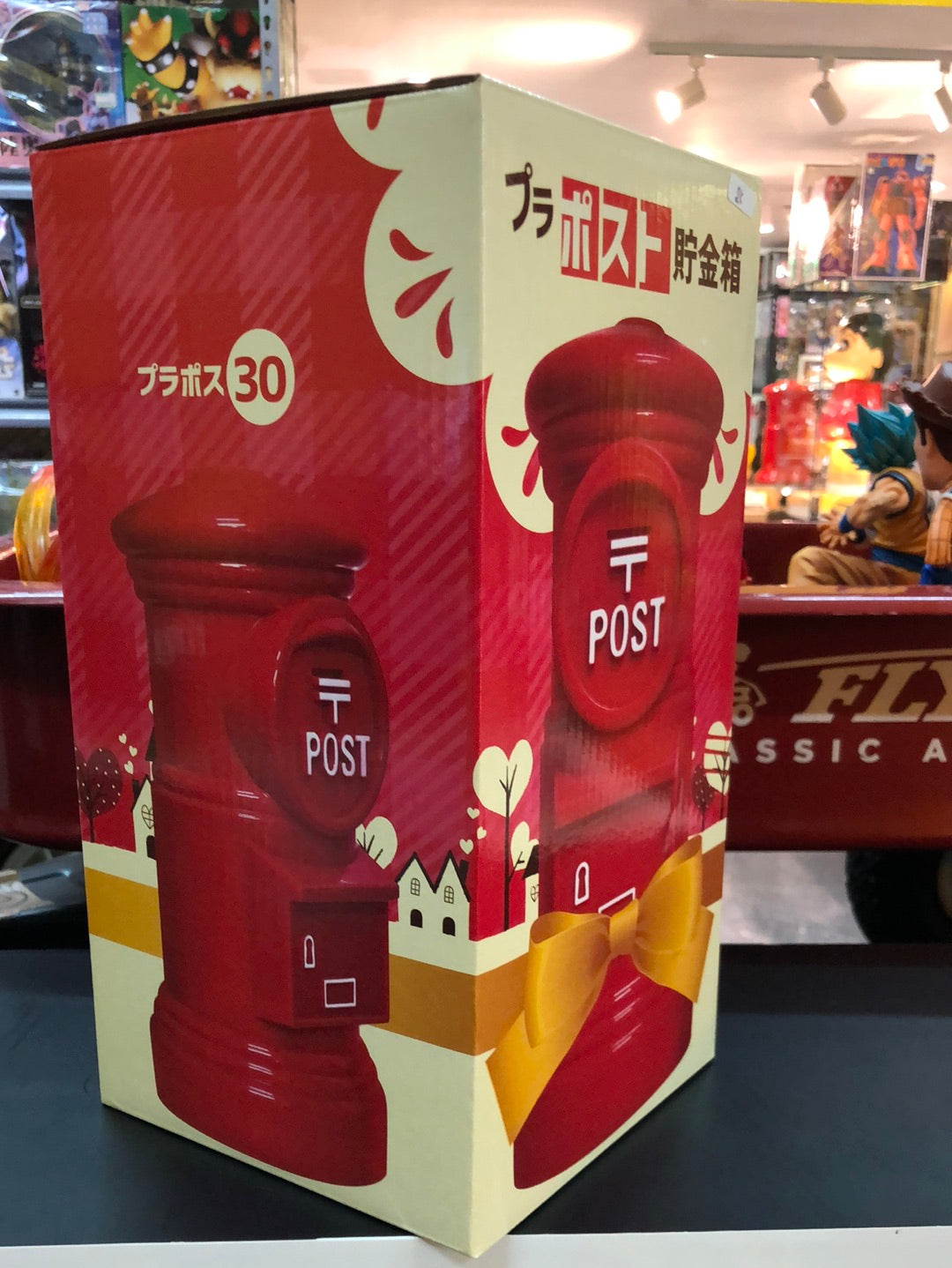 Post plastic coin bank